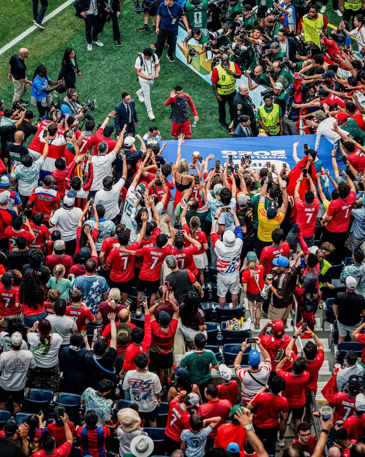 Ronaldo being cheered by fans.